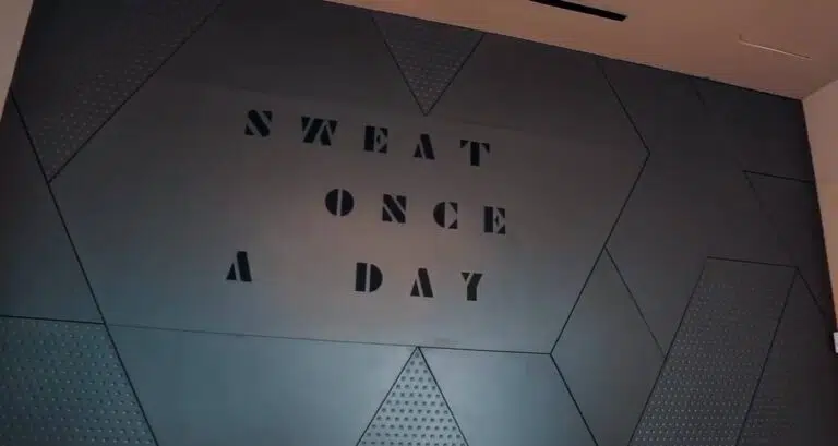 A wall with some writing on it