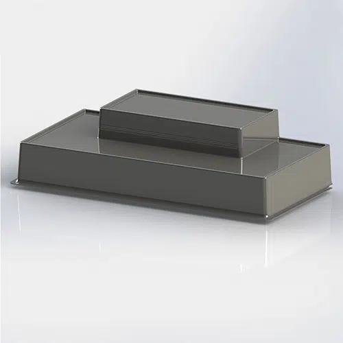 A gray object is sitting on top of the floor.